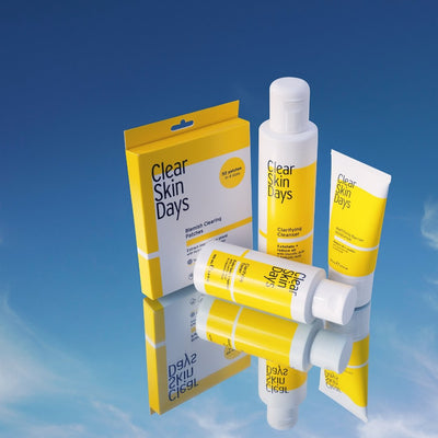 Clear Skin Days | Blemish Control Set with Patches | Products on a blue sky background